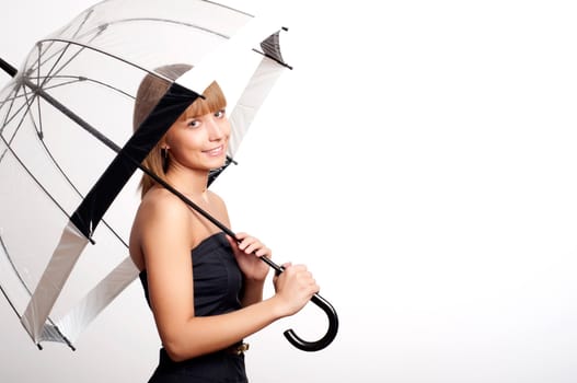 Young fashionable woman smile and holding umbrella