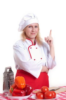 Portrait of attractive cook woman, with a raised finger