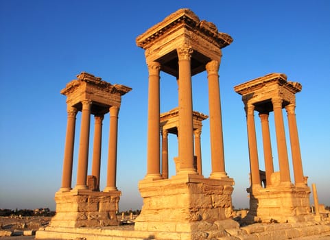 Relics Palmyra in Syria against blue sky. Ancient Roman time town in Palmyra (Tadmor), Syria.