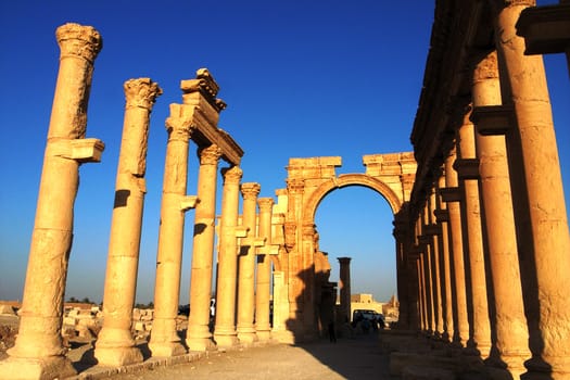 Relics Palmyra in Syria against blue sky. Ancient Roman time town in Palmyra (Tadmor), Syria.