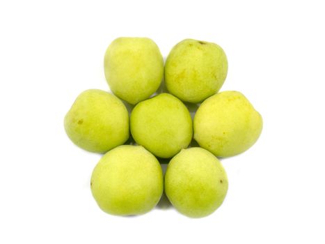 Fresh green plum in flower shape isolated