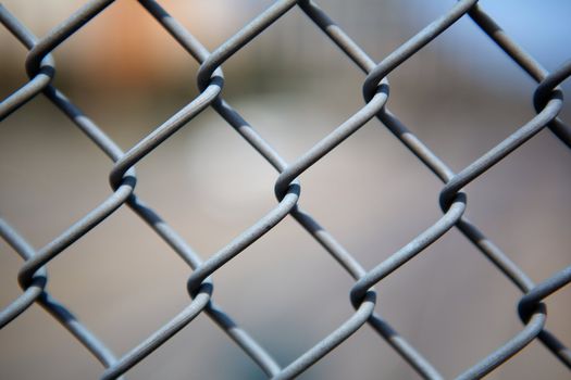 Narrow Dept of Field close up image of chain link fence