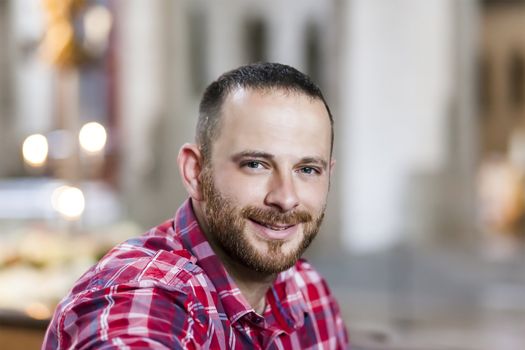 An image of a handsome man with a beard