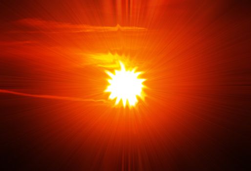 A star burst or lens flare over a black background. It also looks like an abstract illustration of the sun. 