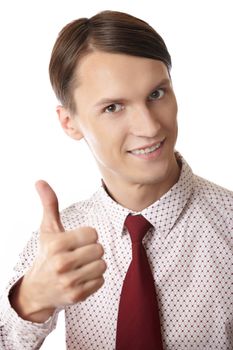 Successful businessman making thumbs up gesture on a white background