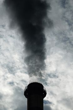 Chimney silhouette with a smoke column on top