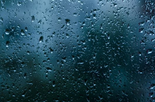 macro picture of rain drops on the window