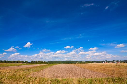 view on rural Ukraine - fields under blue sky