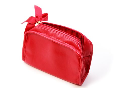 lovely red cosmetic pouch on white background