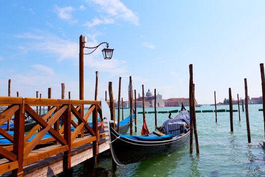 Gondolas on Grand Canal and San Giorgio Maggiore church in Venice