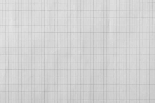 detail of a wrinkled paper sheet with vertical rectangular pattern, horizontal shot