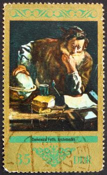 GDR - CIRCA 1973: a stamp printed in GDR shows Archimedes, Painting by Domenico Fetti, circa 1973