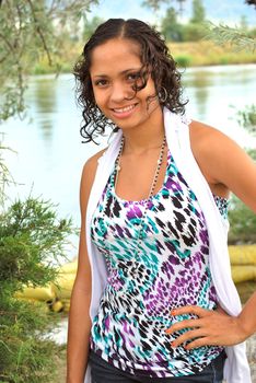 African american female beauty posing outside.