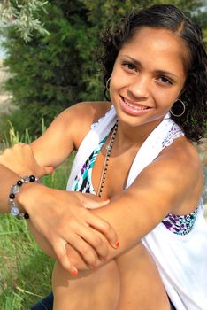 African american female beauty posing outside.