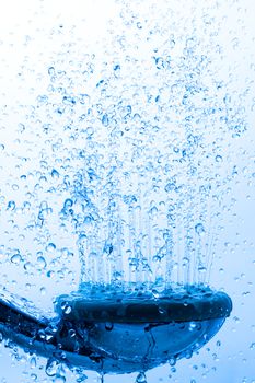 Shower Head with Running Water, Blue background