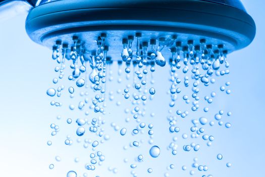 Shower Head with Droplet Water, Blue background