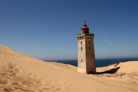 Lighthouse Devoured by Sand on Denmark's North Sea coast near Lonstrup Klint