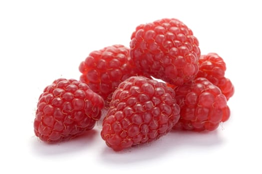 fresh juicy raspberries on white background