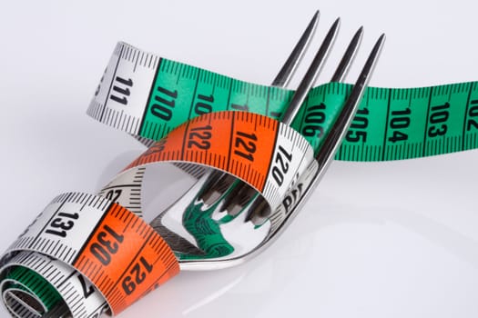 fork with tape measure, illustration for health and  nutrition