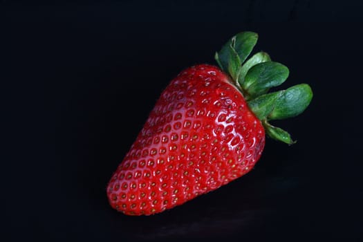 Strawberry on black background