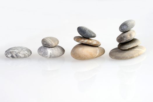 round stones in a line. Concept for statistic, growth etc.