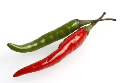 red and green chili on white background,