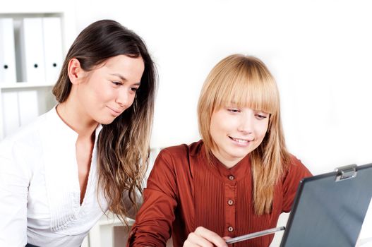 portrait of a beautiful women, teamwork in the office