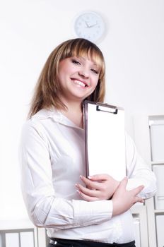 cute woman with tablet in office, portrait