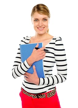 Woman posing with pen and notepad isolated over white