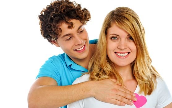 Portrait of beautiful young happy smiling couple isolated on white