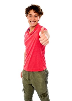 Smart guy standing with thumbs-up against white background