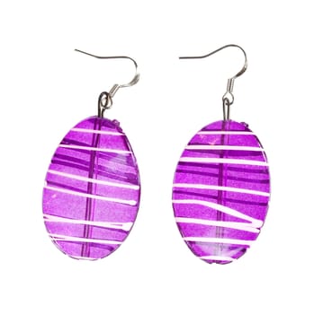 Earrings in purple glass isolated on white background