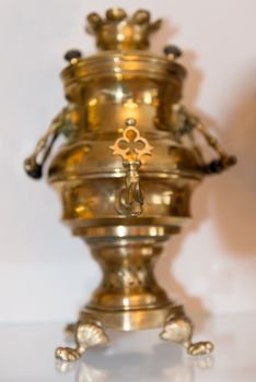 Traditional samovar with selective focus on the front spout