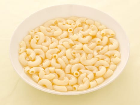 close up of a bowl of macaroni soup