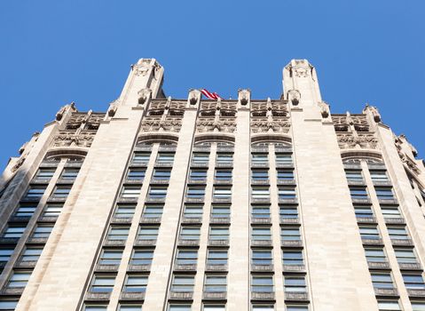 Top of Tribune Tower in Chicago in perspective shot taken from below