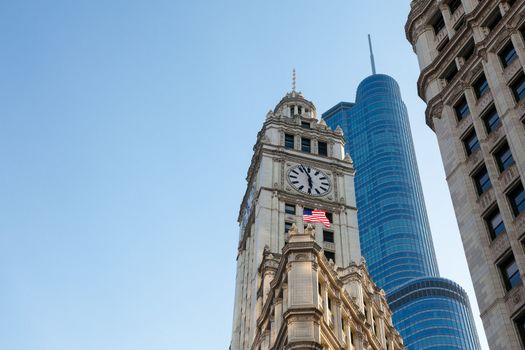 CHICAGO - MAY 14: Trump Tower looms behind Wrigley Building in Chicago on May 14, 2012. Trump Tower tops out at 1389 feet