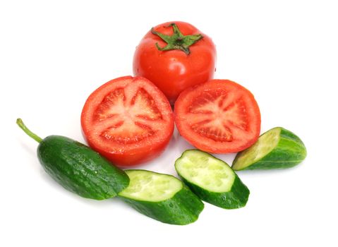 Tomatoes and cucumber isolated on white 