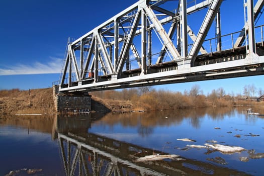 railway bridge through small river