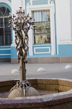 Small fountain in an ancient court yard