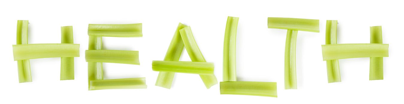 Word HEALTH made of fresh green stems of celery over white background