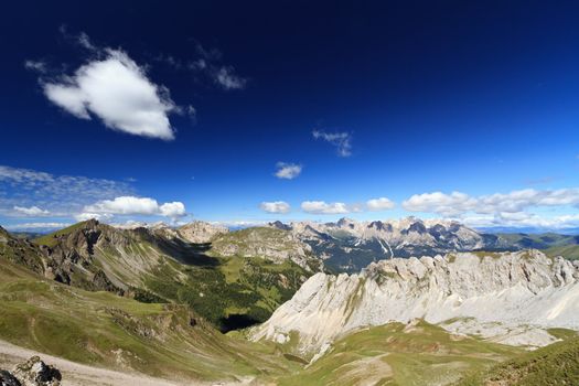 Aerial view of Monzoni Valley with Catinaccio mount on background, Trentino Italy