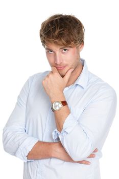 Young business man looking thinking isolated on white background. Casual contemplative businessman in his twenties wearing watch looking at camera. Caucasian male model.