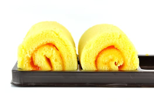 Roll cake on white background