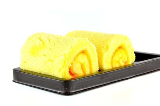 Roll cake on white background