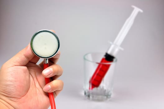 Stethoscope with Syringe