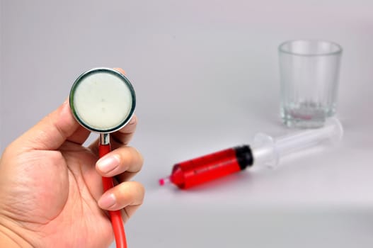 Stethoscope with Syringe