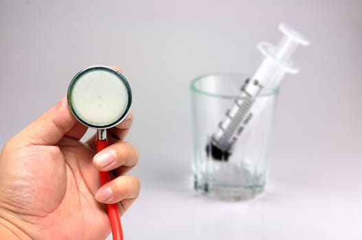 Stethoscope with Syringe