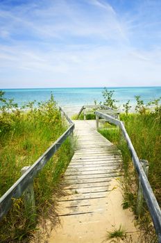 Wooden path over dunes at beach. Pinery provincial park, Ontario Canada