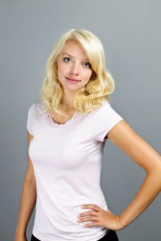 Portrait of young blonde caucasian woman with neutral expression