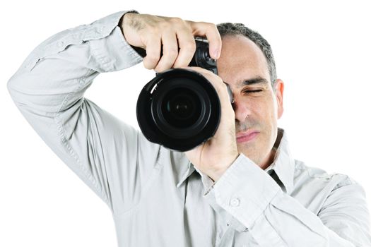 Portrait of male photographer with camera isolated on white background